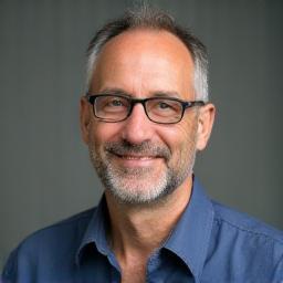 Professional headshot of Giovanni Rossi.